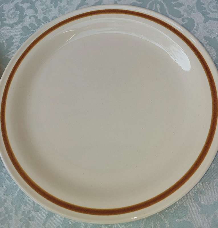 TWO GENUINE STONEWARE VANILLA SPICE PLATES SOLD AS IS