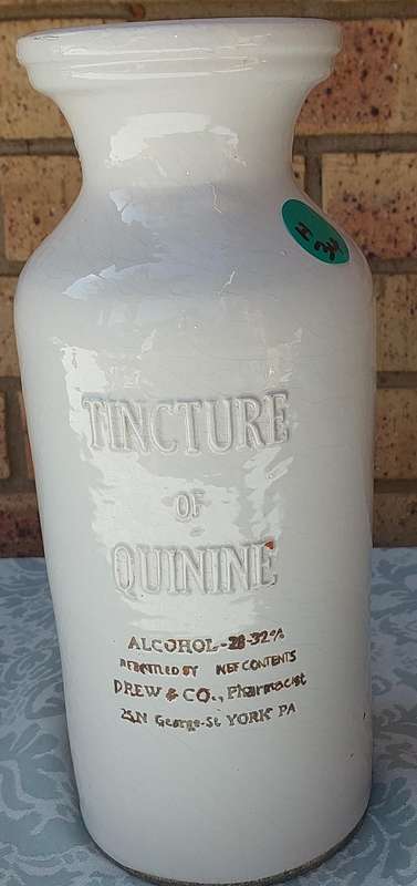 AN ANTIQUE CARA MIA STONEWARE ALCOHOL BOTTLE SOOD AS IS