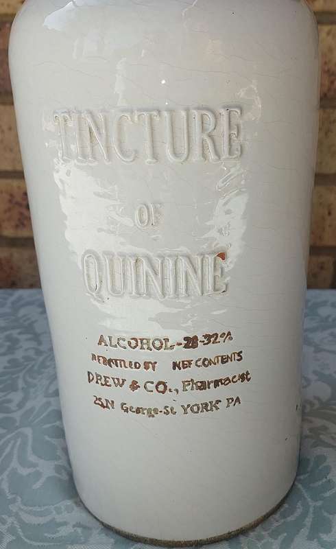 AN ANTIQUE CARA MIA STONEWARE ALCOHOL BOTTLE SOOD AS IS