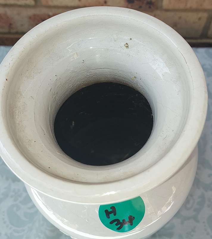 AN ANTIQUE CARA MIA STONEWARE ALCOHOL BOTTLE SOOD AS IS