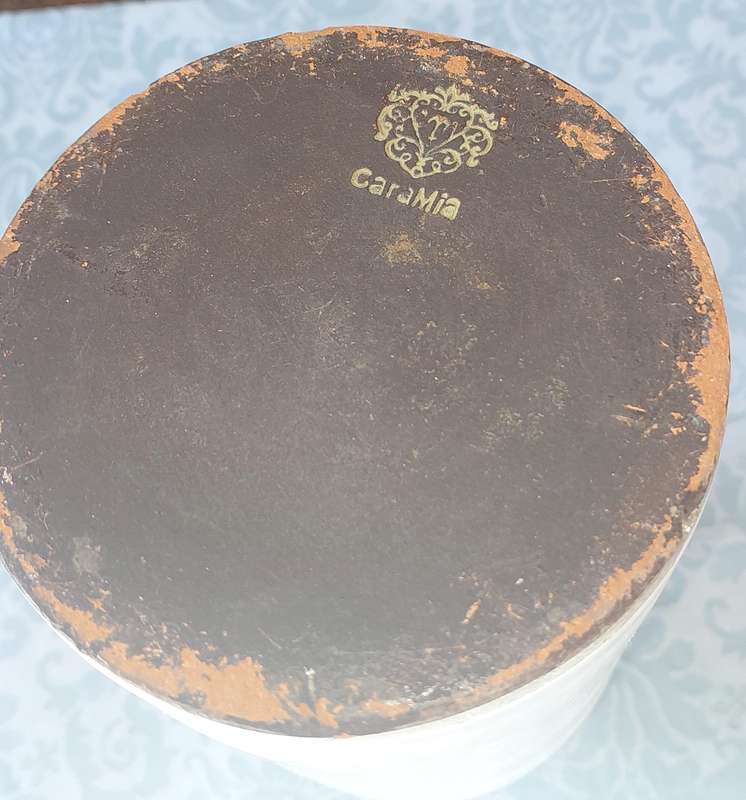 AN ANTIQUE CARA MIA STONEWARE ALCOHOL BOTTLE SOOD AS IS