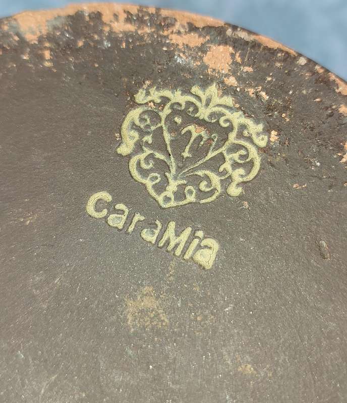 AN ANTIQUE CARA MIA STONEWARE ALCOHOL BOTTLE SOOD AS IS