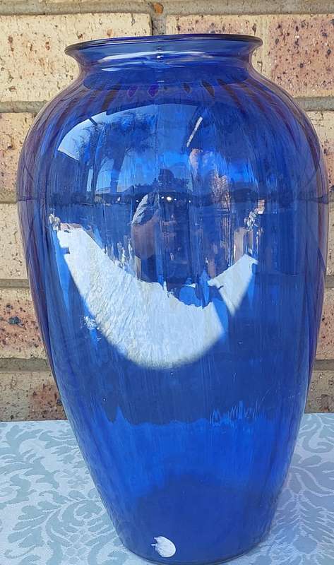 A LARGE ARCTIC BLUE VASE SOLD AS IS