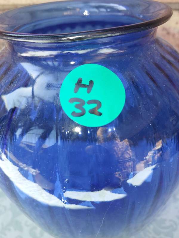 A LARGE ARCTIC BLUE VASE SOLD AS IS