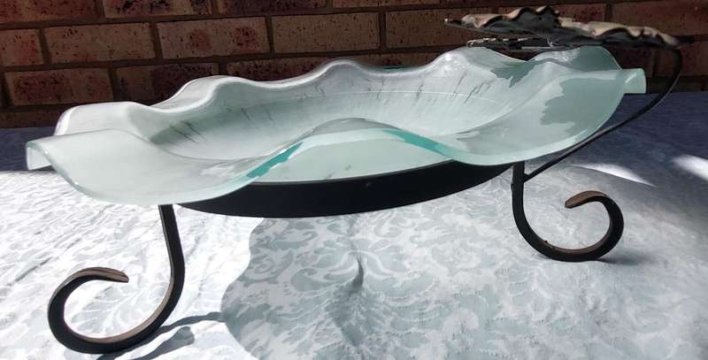 A WRATH IRON AND GLASS ART DECOR FRUIT BOWL STAND SOLD AS IS