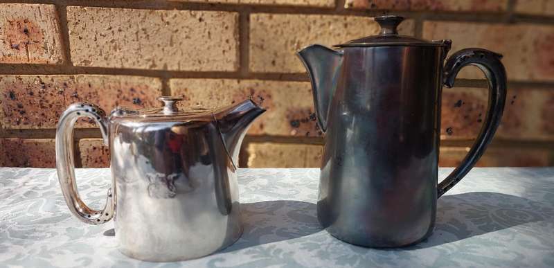 TWO ANTIQUE SOUTH AFRICAN RAILWAYS SERVING JUGS SOLD AS IS