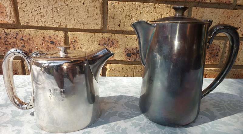 TWO ANTIQUE SOUTH AFRICAN RAILWAYS SERVING JUGS SOLD AS IS