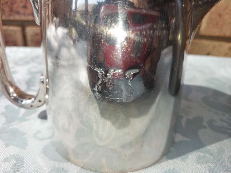 TWO ANTIQUE SOUTH AFRICAN RAILWAYS SERVING JUGS SOLD AS IS