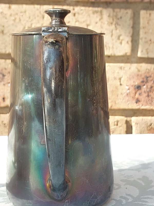 TWO ANTIQUE SOUTH AFRICAN RAILWAYS SERVING JUGS SOLD AS IS