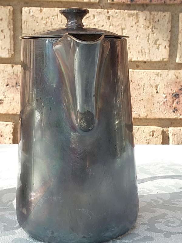 TWO ANTIQUE SOUTH AFRICAN RAILWAYS SERVING JUGS SOLD AS IS