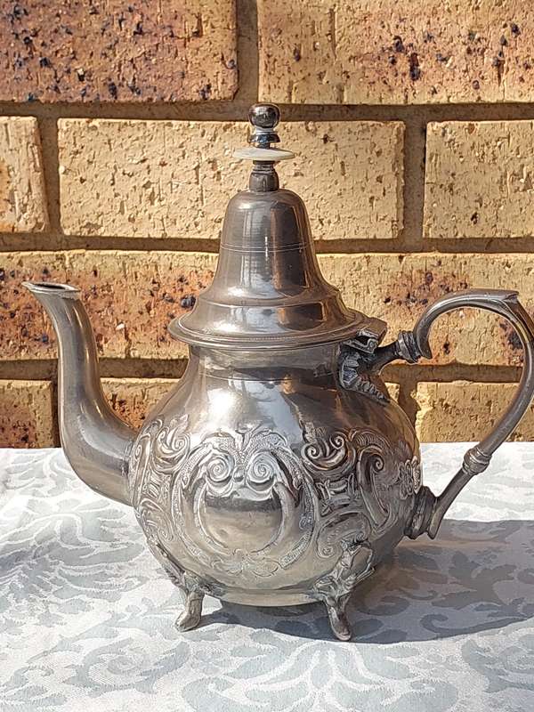 A VINTAGE MORROCAN LAZARAK MOHAMMED TEAPOT SOLD AS IS