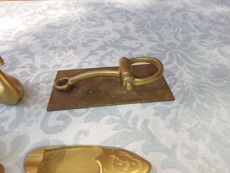A COLLECTION OF BRASS FIGURINES AND UTENSILS SOLD AS IS
