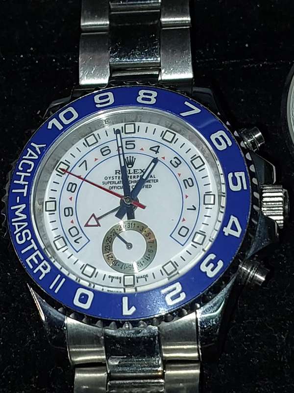 A COLLECTION OF QUALITY REPLICA BRANDED WATCHES SOLD AS IS