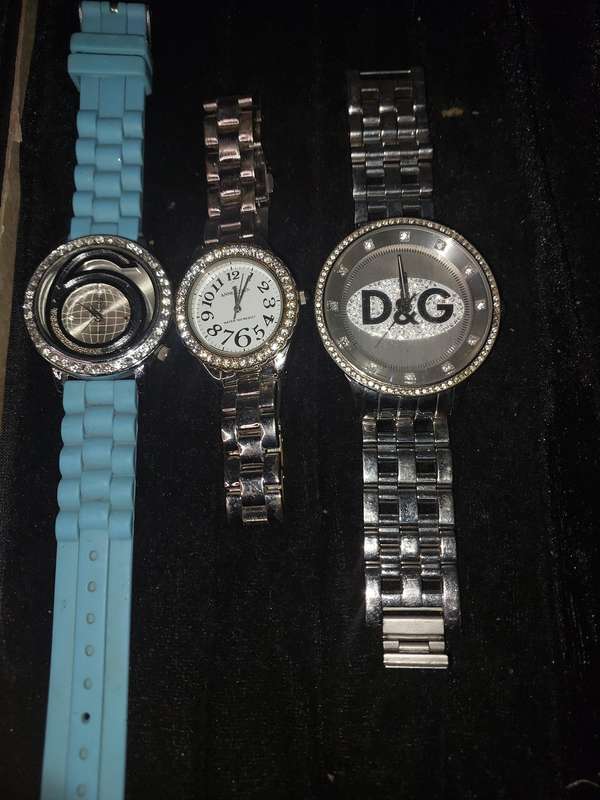 A COLLECTION OF USED COSTUME WATCHES SOLD AS IS NOT TESTED