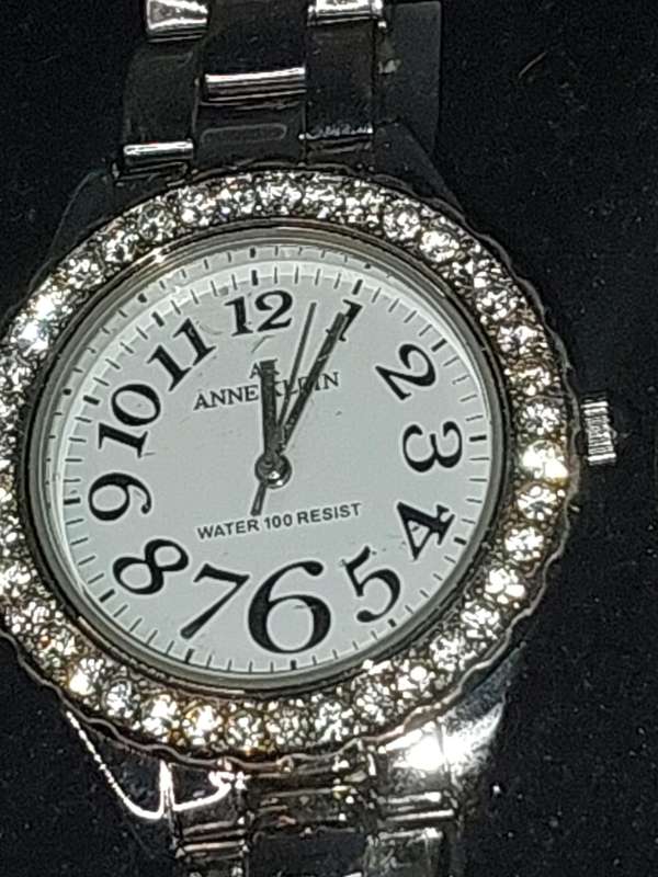 A COLLECTION OF USED COSTUME WATCHES SOLD AS IS NOT TESTED