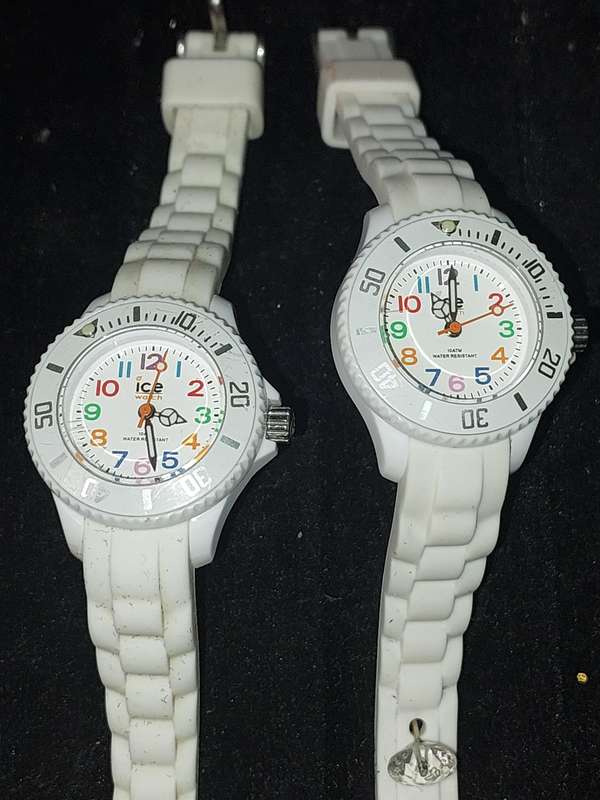 TWO WHITE LADYS ICE WATCHES NEED NEW BATTERIES SOLD AS IS NOT TESTED