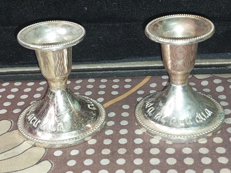 A PAIR OF JUDAICA CANDLE HOLER SILVER PLATED SOLD AS IS