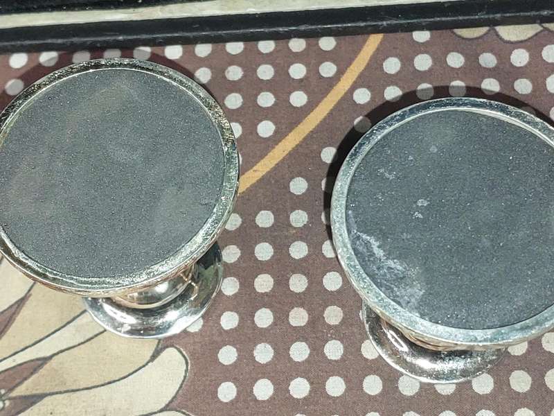 A PAIR OF JUDAICA CANDLE HOLER SILVER PLATED SOLD AS IS