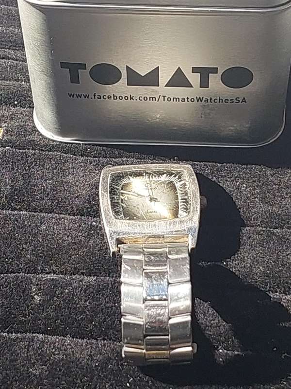 A USED TAMATO WRIST WATCH STAINLESS STEEL SOLD AS IS NOT TESTED