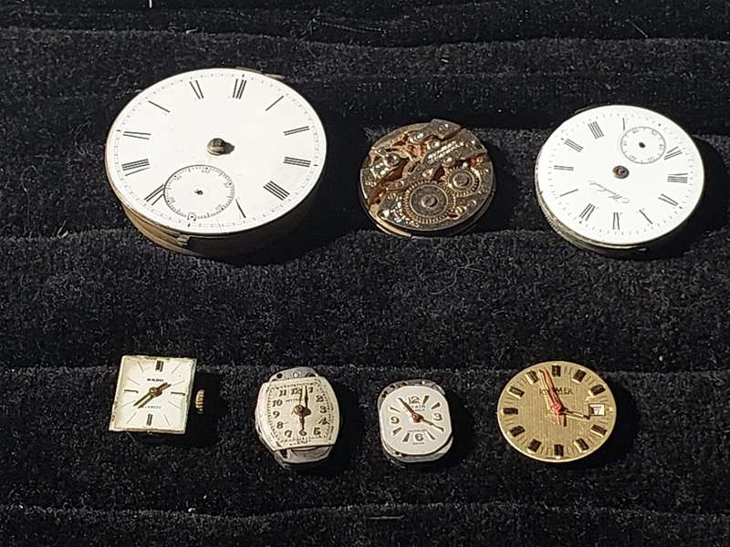 A VINTAGE AND ANTIQUE COLLECTION WATCH MACHINISMS SOLD AS IS