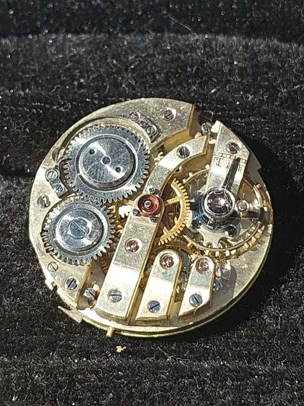 A VINTAGE AND ANTIQUE COLLECTION WATCH MACHINISMS SOLD AS IS