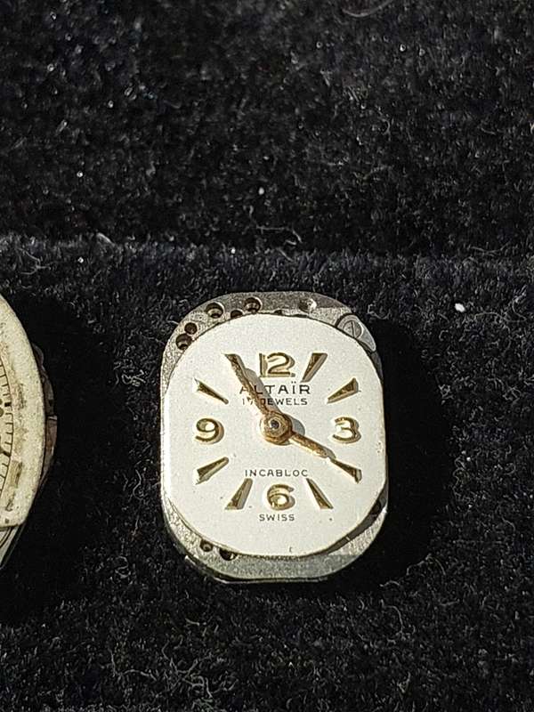 A VINTAGE AND ANTIQUE COLLECTION WATCH MACHINISMS SOLD AS IS