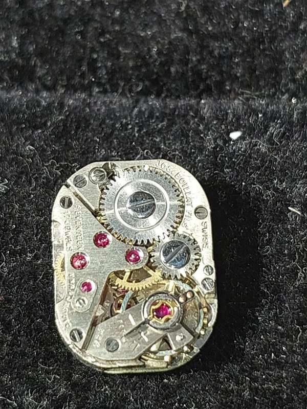 A VINTAGE AND ANTIQUE COLLECTION WATCH MACHINISMS SOLD AS IS