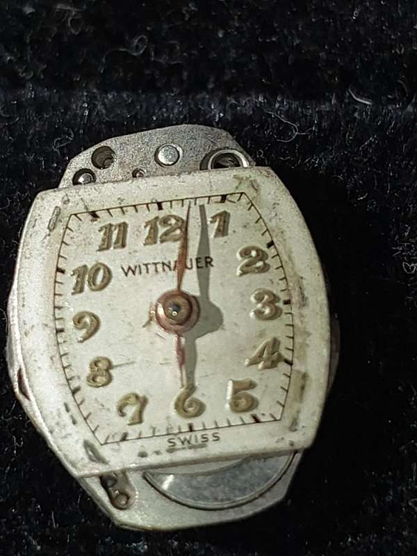 A VINTAGE AND ANTIQUE COLLECTION WATCH MACHINISMS SOLD AS IS