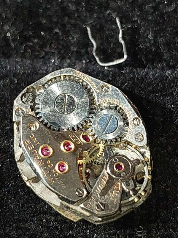A VINTAGE AND ANTIQUE COLLECTION WATCH MACHINISMS SOLD AS IS