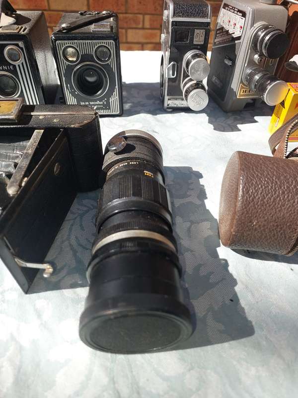 AN ANTIQUE COLLECTION CAMERAS SOLD AS IS
