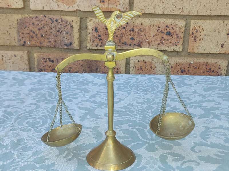 A VINTAGE ART DECOR BRASS ORNAMENTAL SCALE BALANCE SOLD AS IS