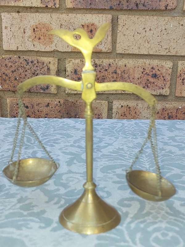 A VINTAGE ART DECOR BRASS ORNAMENTAL SCALE BALANCE SOLD AS IS