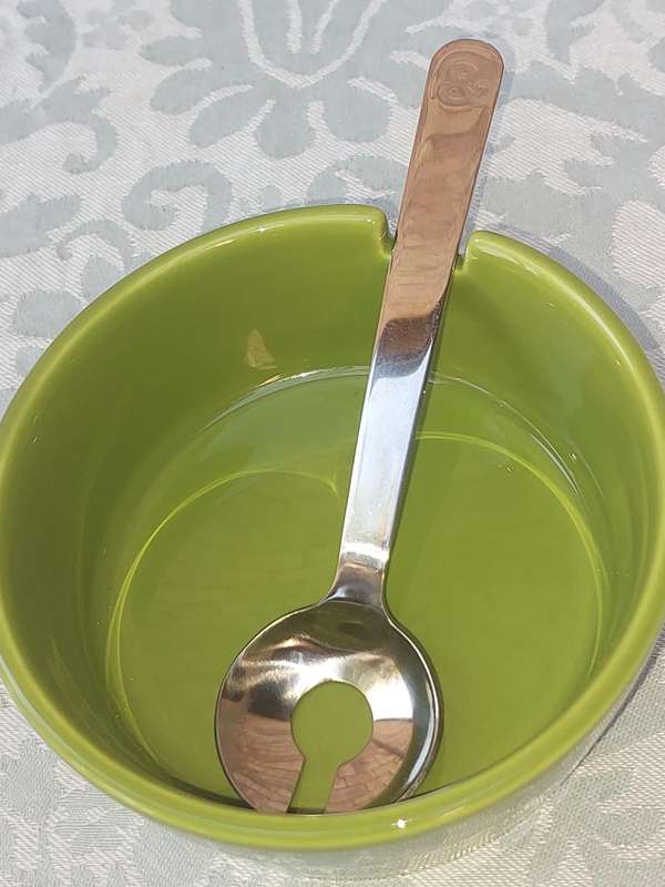TWO DELISH S A & P OLIVE DISHES WITH SPOONS SOLD AS IS