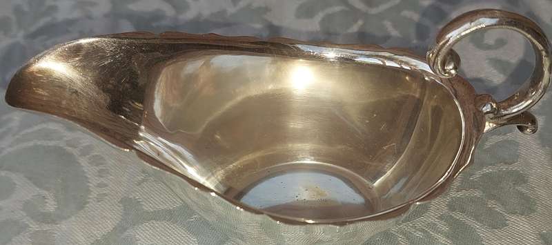 A VINTAGE COLLECTION SILVER PLATED CANOP'E SERVING DISHES SOLD AS IS