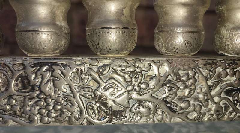 A VINTAGE ISRAEL JUDAICA MENORA SOLD AS IS