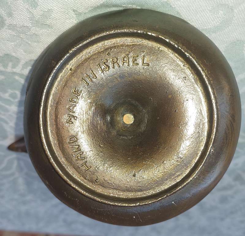 A VINTAGE ART DECOR MADE IN ISRAEL BRASS WITH GREEN TINT NUT CRACKER SOLD AS IS