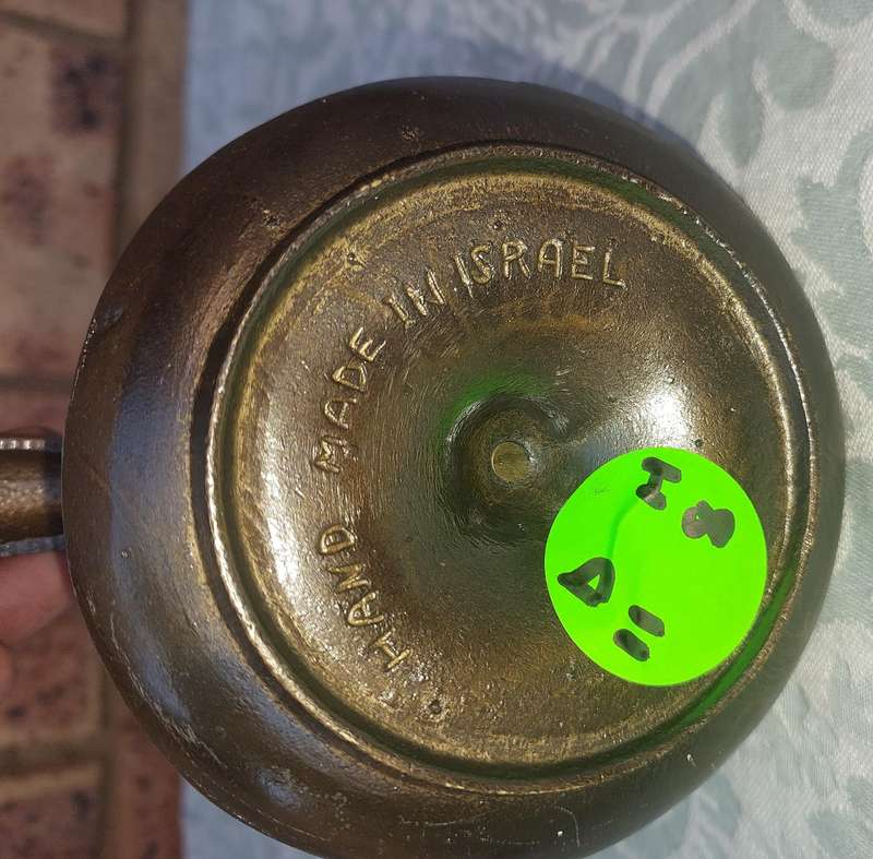 A VINTAGE ART DECOR MADE IN ISRAEL BRASS WITH GREEN TINT NUT CRACKER SOLD AS IS