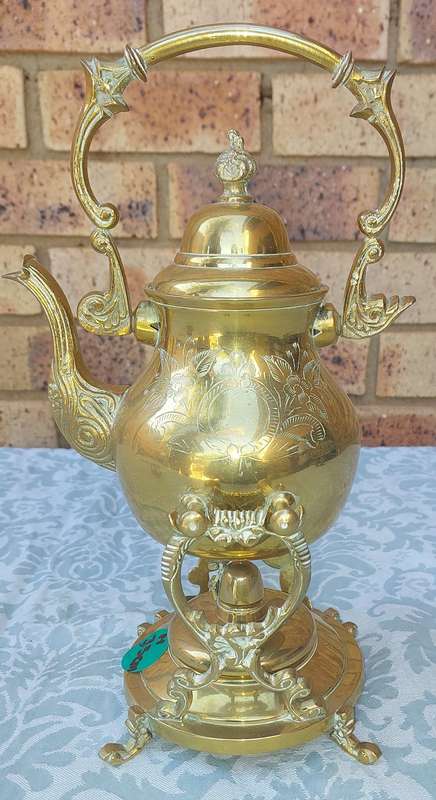 Vintage Brass and Silver Plated Tipping Teapot sold as is