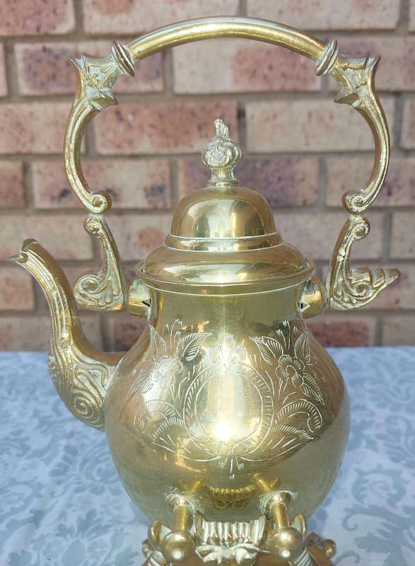 Vintage Brass and Silver Plated Tipping Teapot sold as is