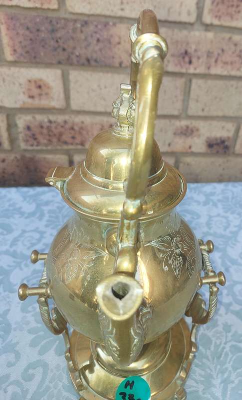 Vintage Brass and Silver Plated Tipping Teapot sold as is