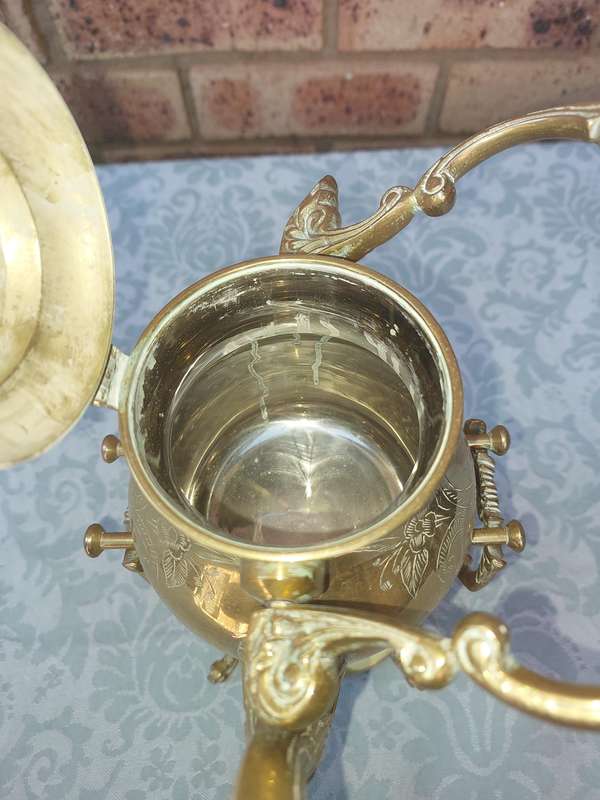 Vintage Brass and Silver Plated Tipping Teapot sold as is