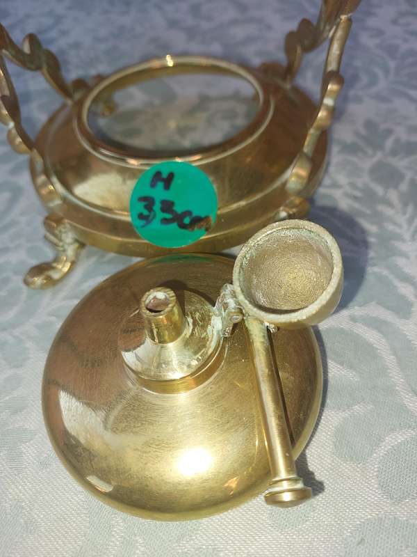 Vintage Brass and Silver Plated Tipping Teapot sold as is