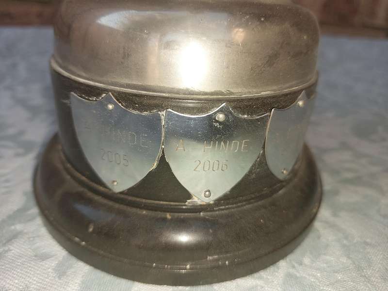 A VINTAGE TENNIS CHAMPIONS FLAOTING TROPHY SOLD AS IS