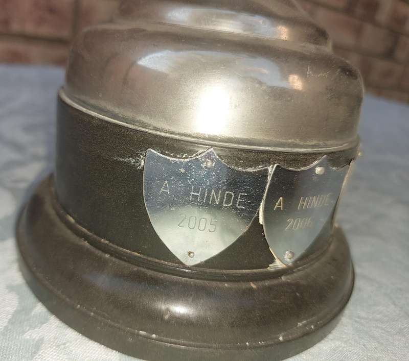 A VINTAGE TENNIS CHAMPIONS FLAOTING TROPHY SOLD AS IS