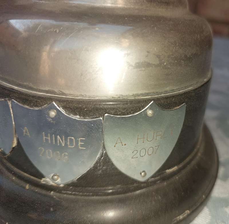 A VINTAGE TENNIS CHAMPIONS FLAOTING TROPHY SOLD AS IS