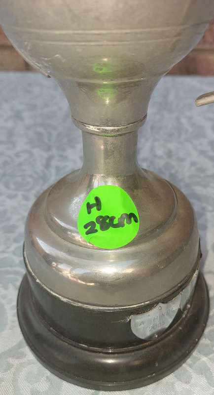 A VINTAGE TENNIS CHAMPIONS FLAOTING TROPHY SOLD AS IS
