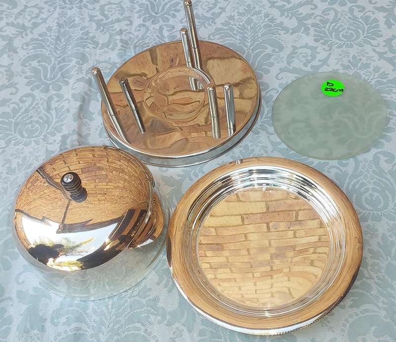 A VINTAGE SILVER PLATED TUREEN WITH AN INNER GLASS TRAY AND A WARMER STAND SOLD AS IS