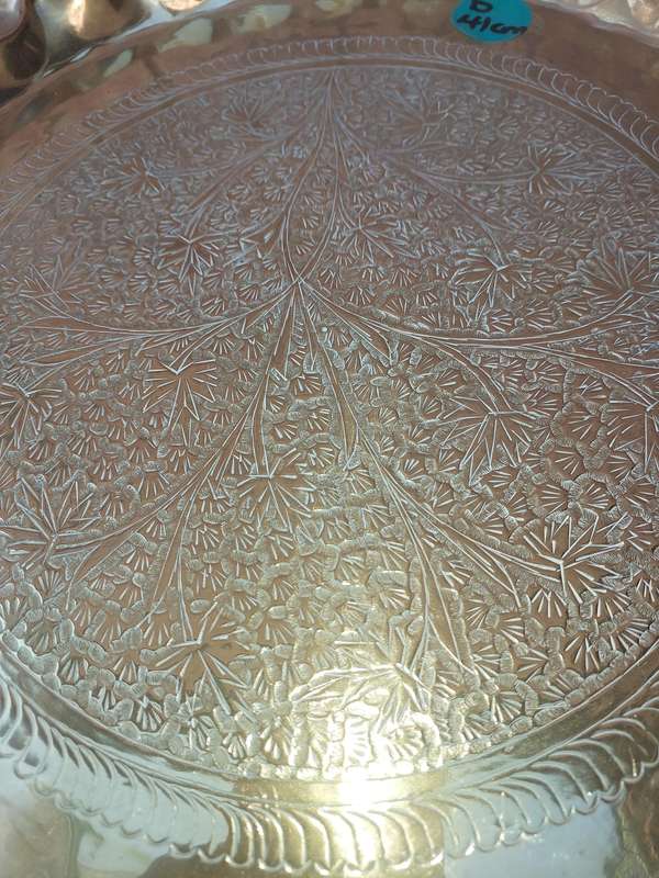 AN ART DECOR BRASS HAMMERED MORROCAN STYLE WALL PLAQUE SOLD AS IS
