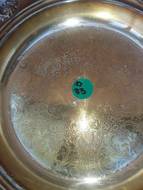 A VINTAGE VICTORIAN FOOTED SILVER PLATED SERVING TRAY SOLD AS IS