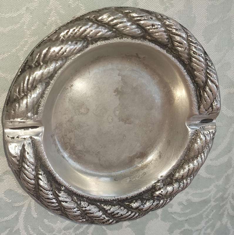 A PAIR OF PEWTER ART DECOR ASH TRAYS SOLD AS IS